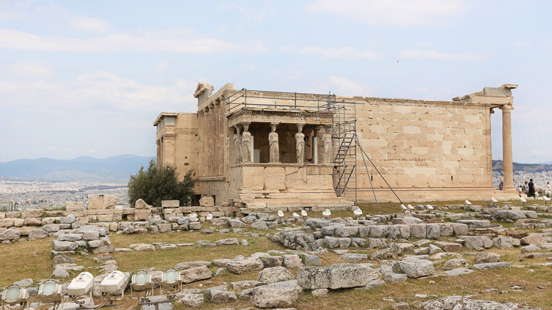 The Acropolis of Athens   is an ancient citadel located on a high rocky outcrop above the city of Athens and contains the remains of several ancient buildings of great architectural and historic significance, the most famous being the Parthenon. 